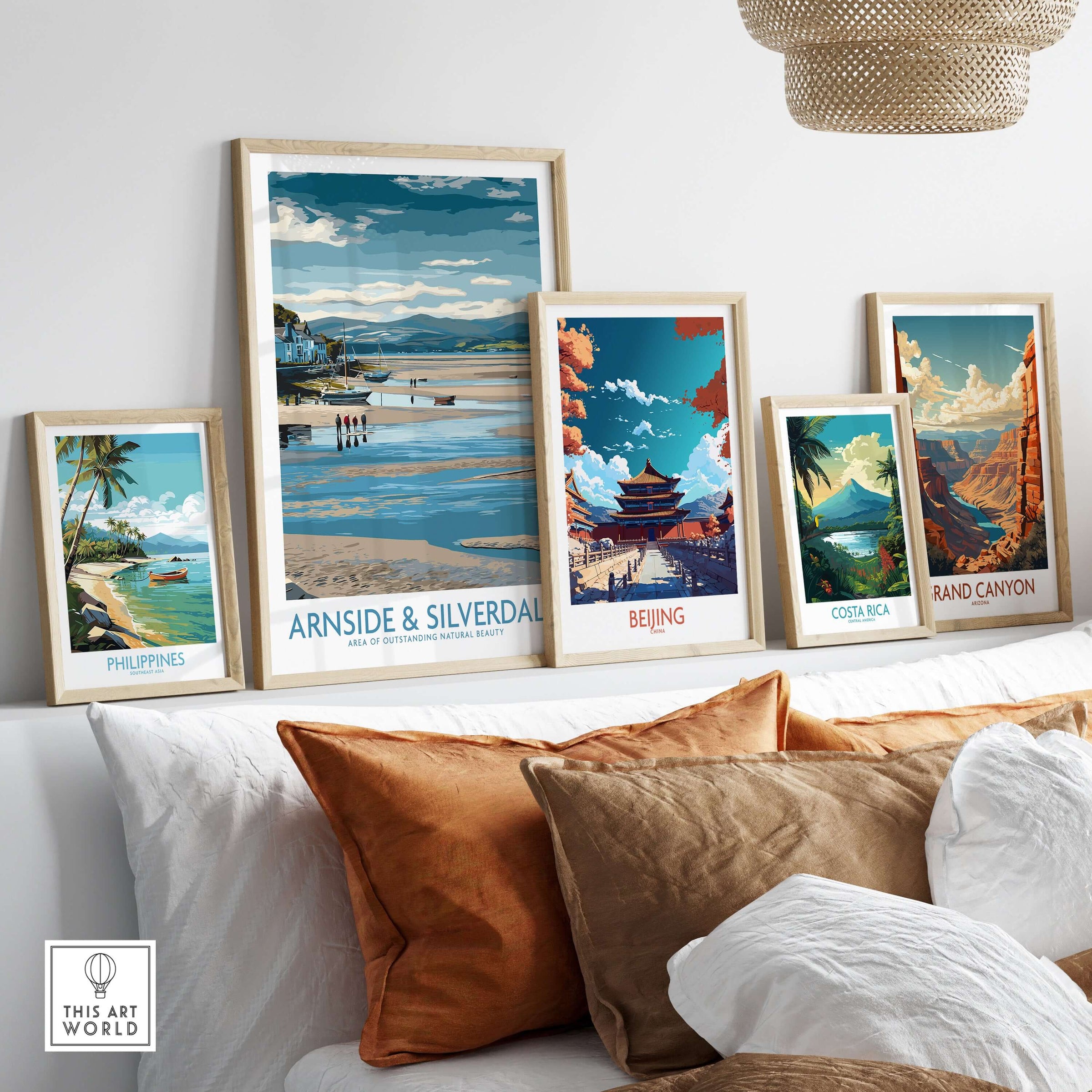 Arnside and Silverdale AONB Wall Art Print displayed among other travel-themed prints in a cozy living room setting.