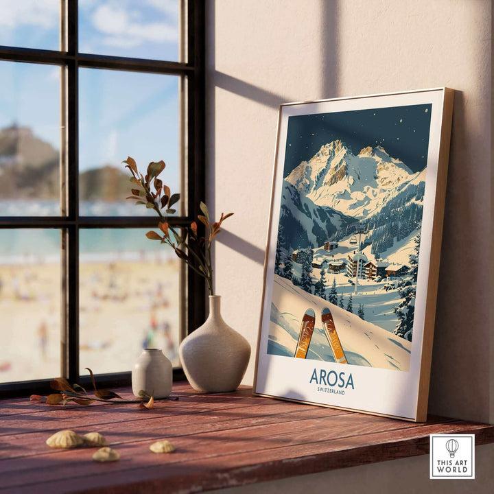 Arosa Ski Print showcasing Swiss Alps beauty, framed on a window sill with a cozy indoor setting.