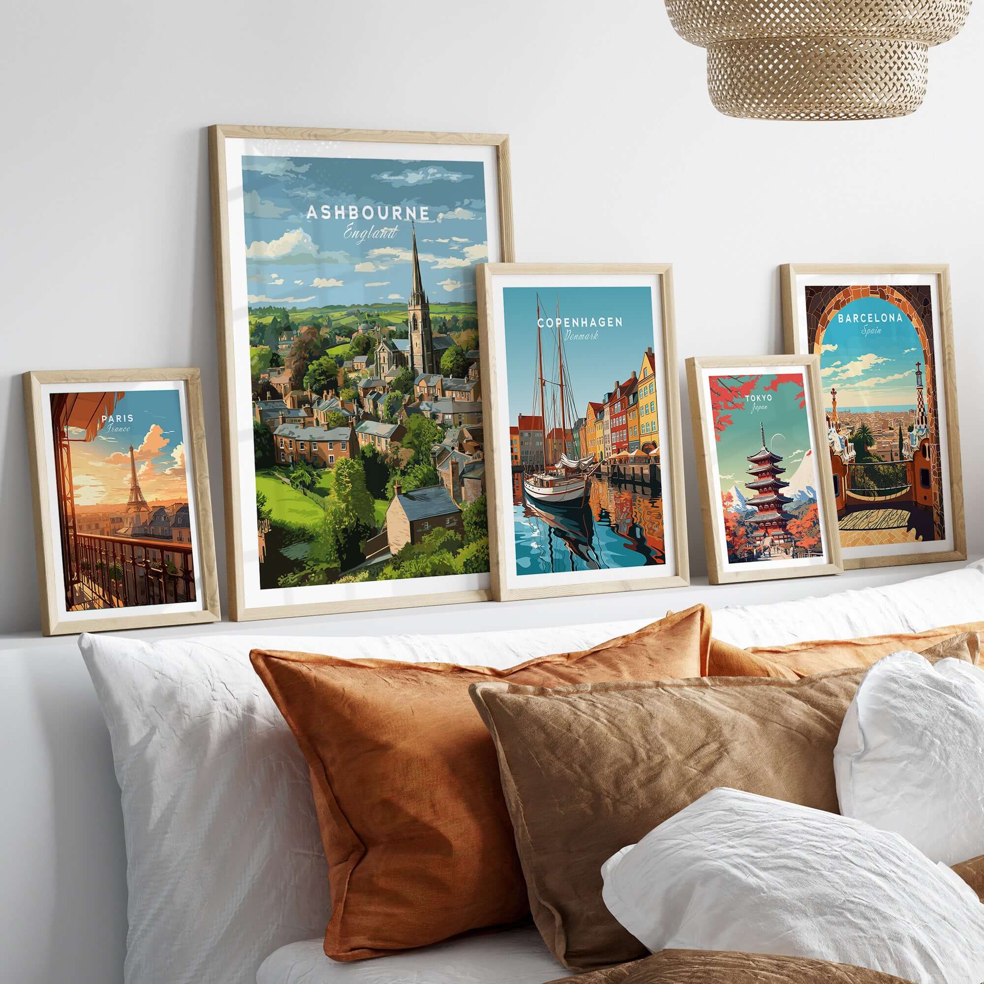 Ashbourne Print - Peak District Village Art - Rural England Travel Poster among framed art in a cozy living space.