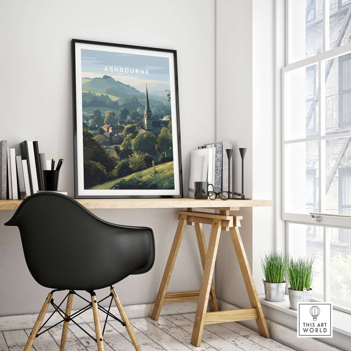 Ashbourne St Oswald's wall art print displayed in a modern workspace, showcasing serene rural England scenery.