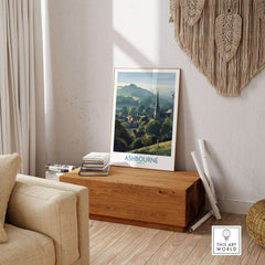Ashbourne Travel Poster - English Landscape Print - Derbyshire Peak District Art - Scenic Wall Decor in a cozy living room setting.