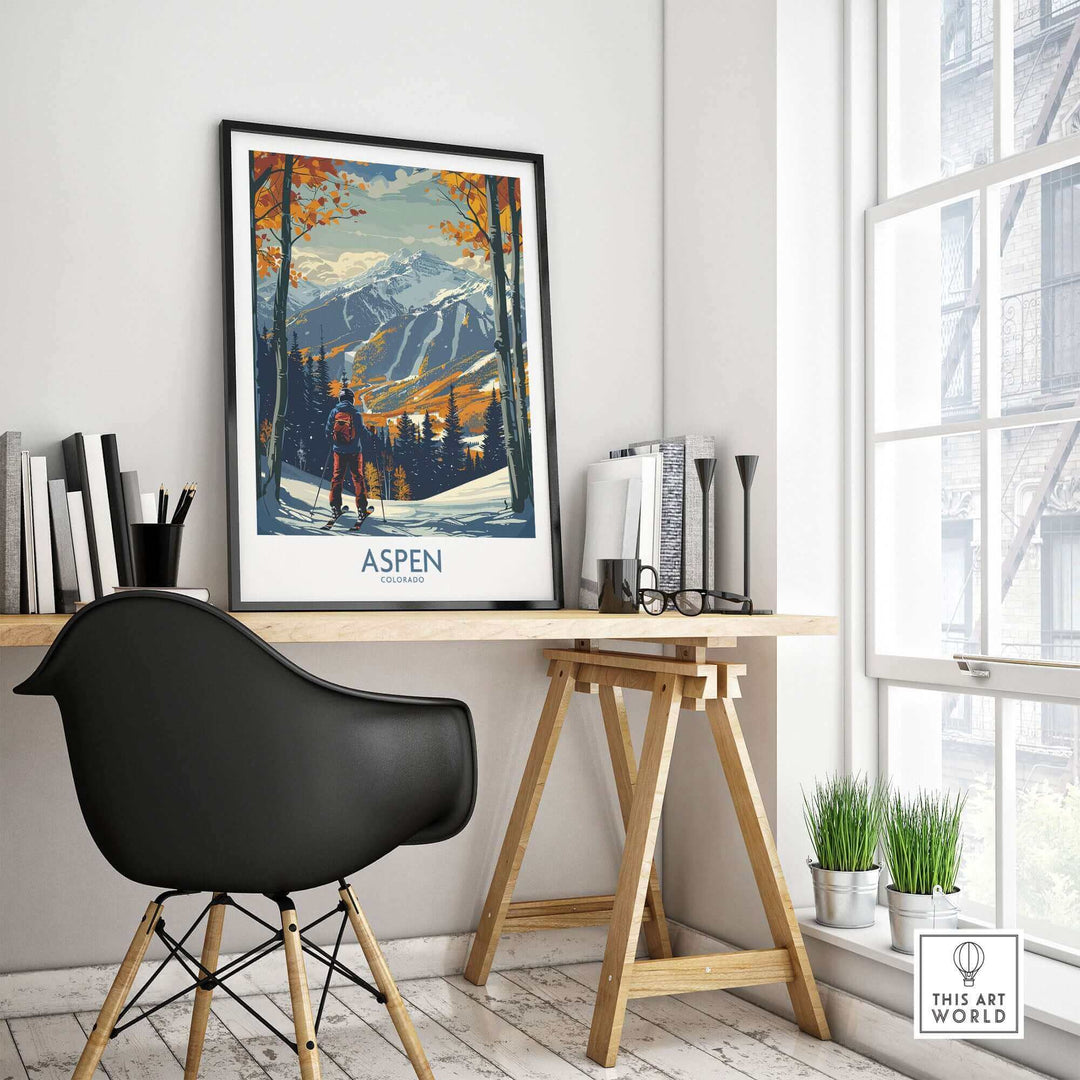 Aspen ski poster print displayed on a desk, showcasing vibrant skiing landscape artwork, enhancing room decor with energy and inspiration.