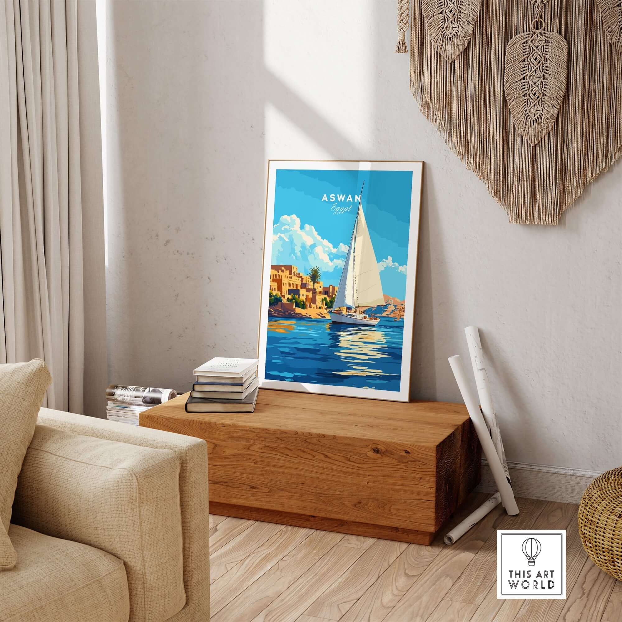 Aswan Print Egypt artwork displayed in a bright living room with a sailboat and vibrant colors.