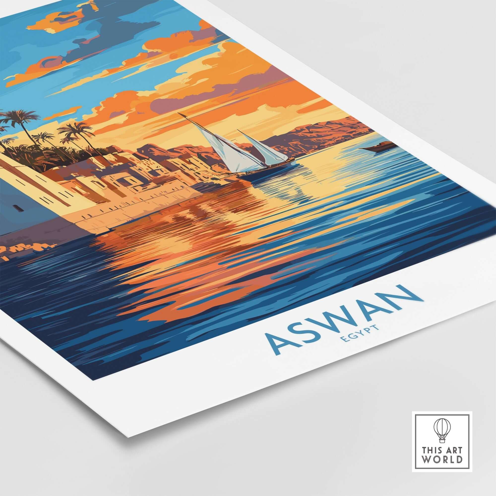 Aswan Travel Poster showcasing the vibrant sunset over the Nile with traditional feluccas in Aswan, Egypt.
