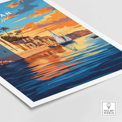 Aswan Travel Print showcasing vibrant sunset over the Nile with sailboats and colorful buildings reflecting in the water.