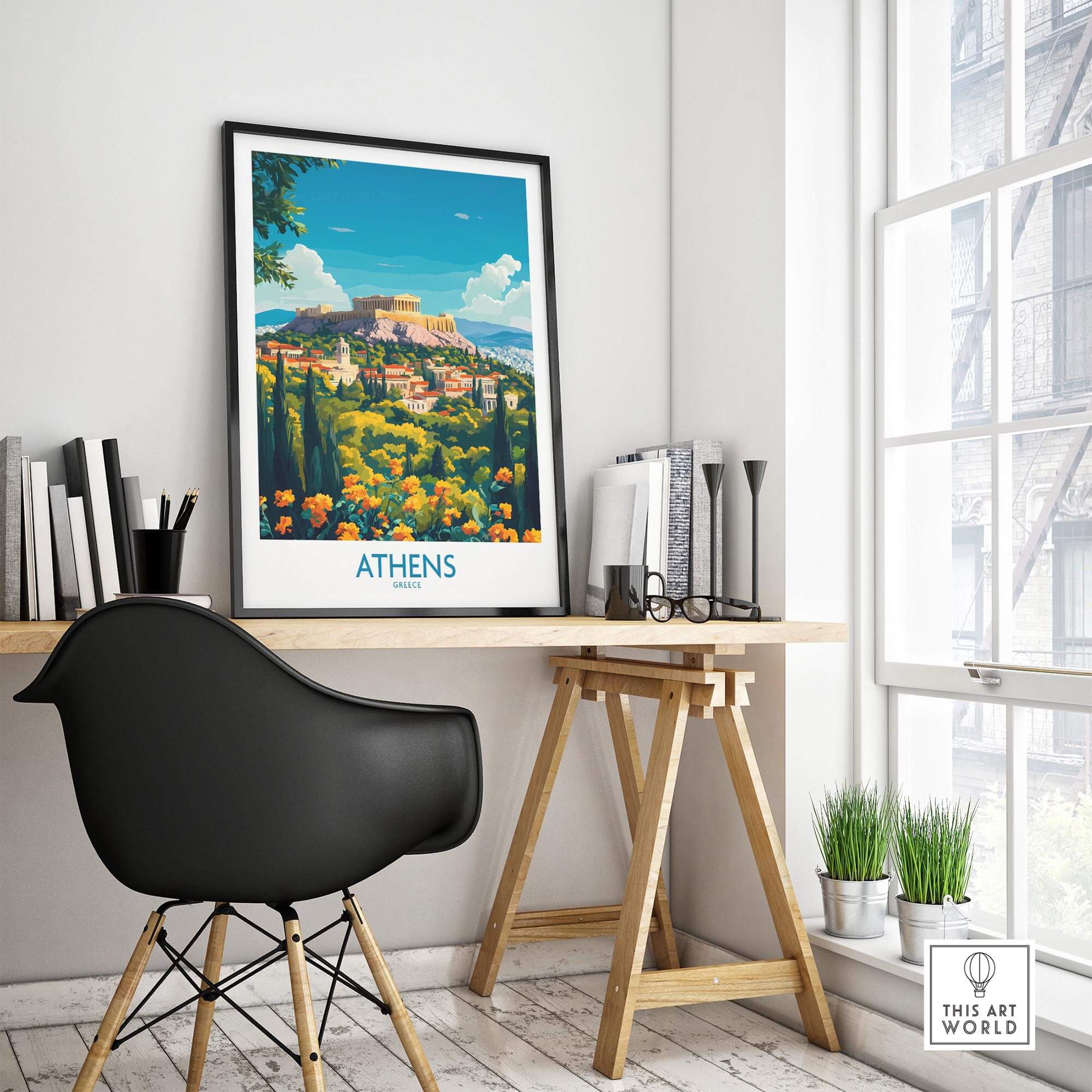 Athens Travel Poster displayed in a bright workspace with plants and books, showcasing Athens' beauty and culture.