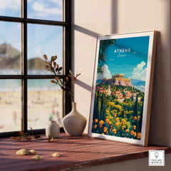 Athens Travel Print framed on a wooden table with a scenic view of Greece and flowers, capturing the essence of Athens.