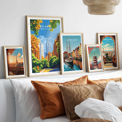 Atlanta Wall Art displayed among other city-themed artwork on a cozy couch, enhancing urban charm.