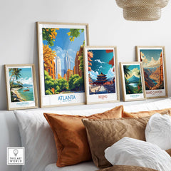 Atlanta Wall Art Print displayed among other travel-themed prints on a stylish shelf.