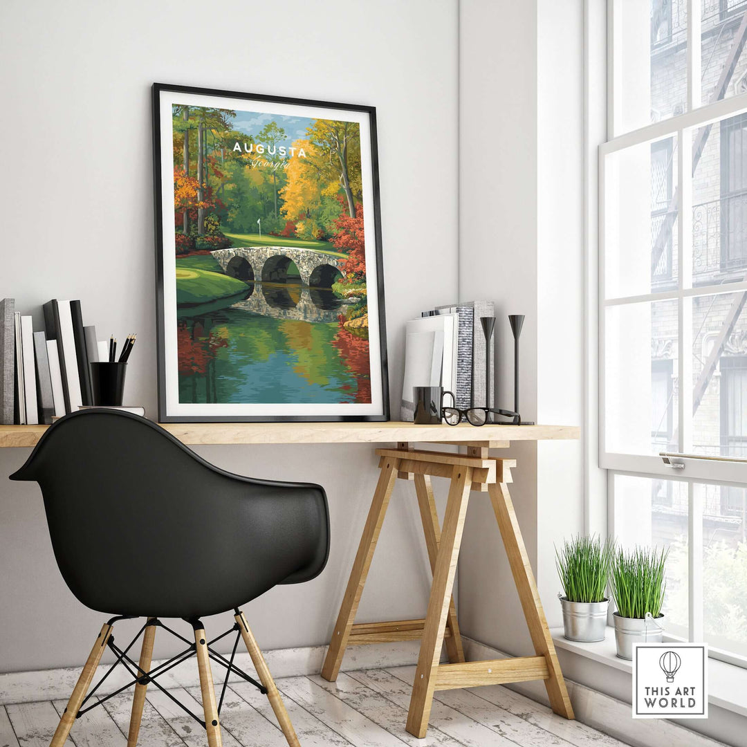 Augusta Georgia Hogan Bridge golf print framed in a modern workspace, showcasing vibrant autumn colors.