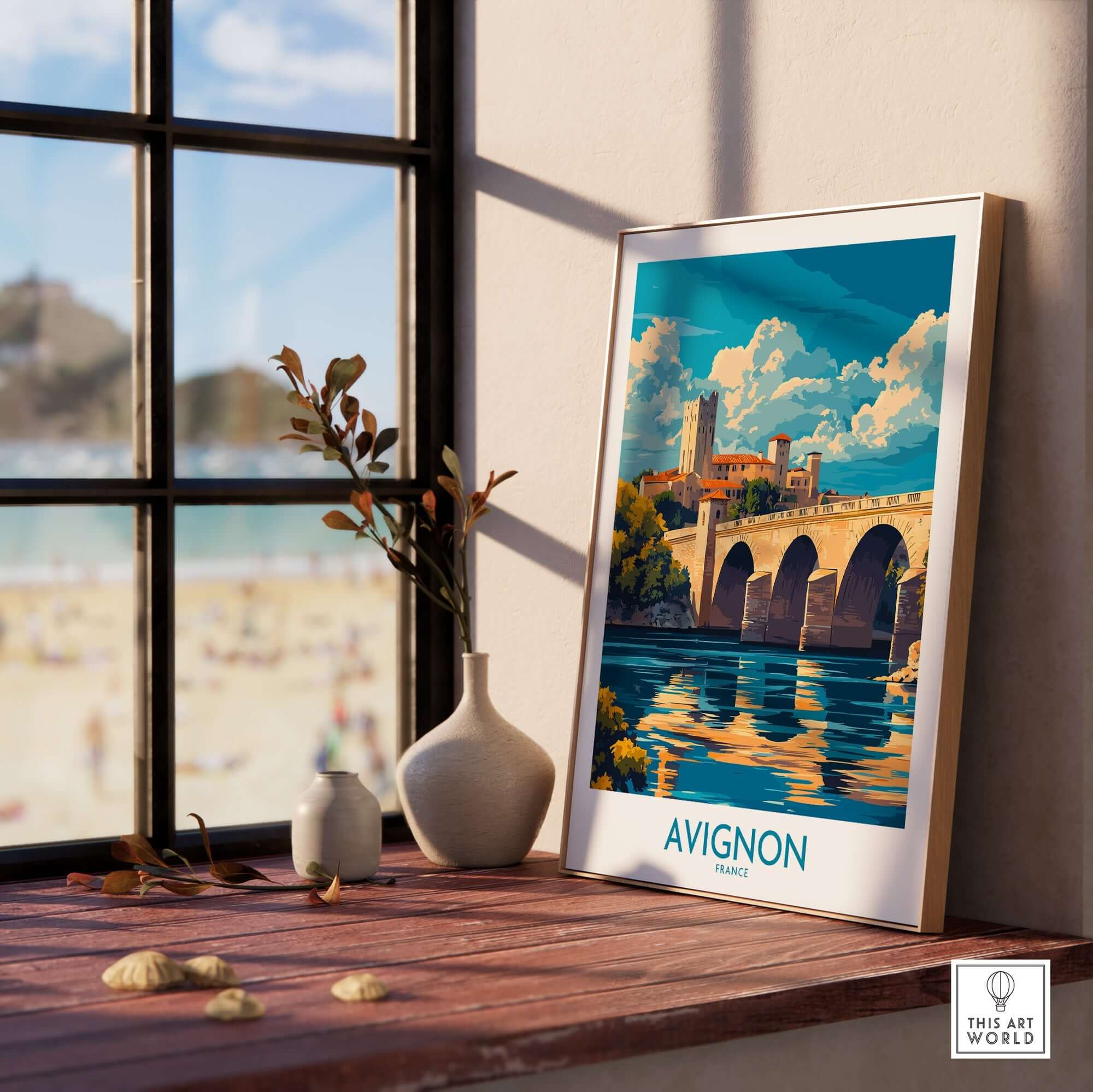Avignon Travel Poster displayed in a bright room with a view of the beach and decorative elements.