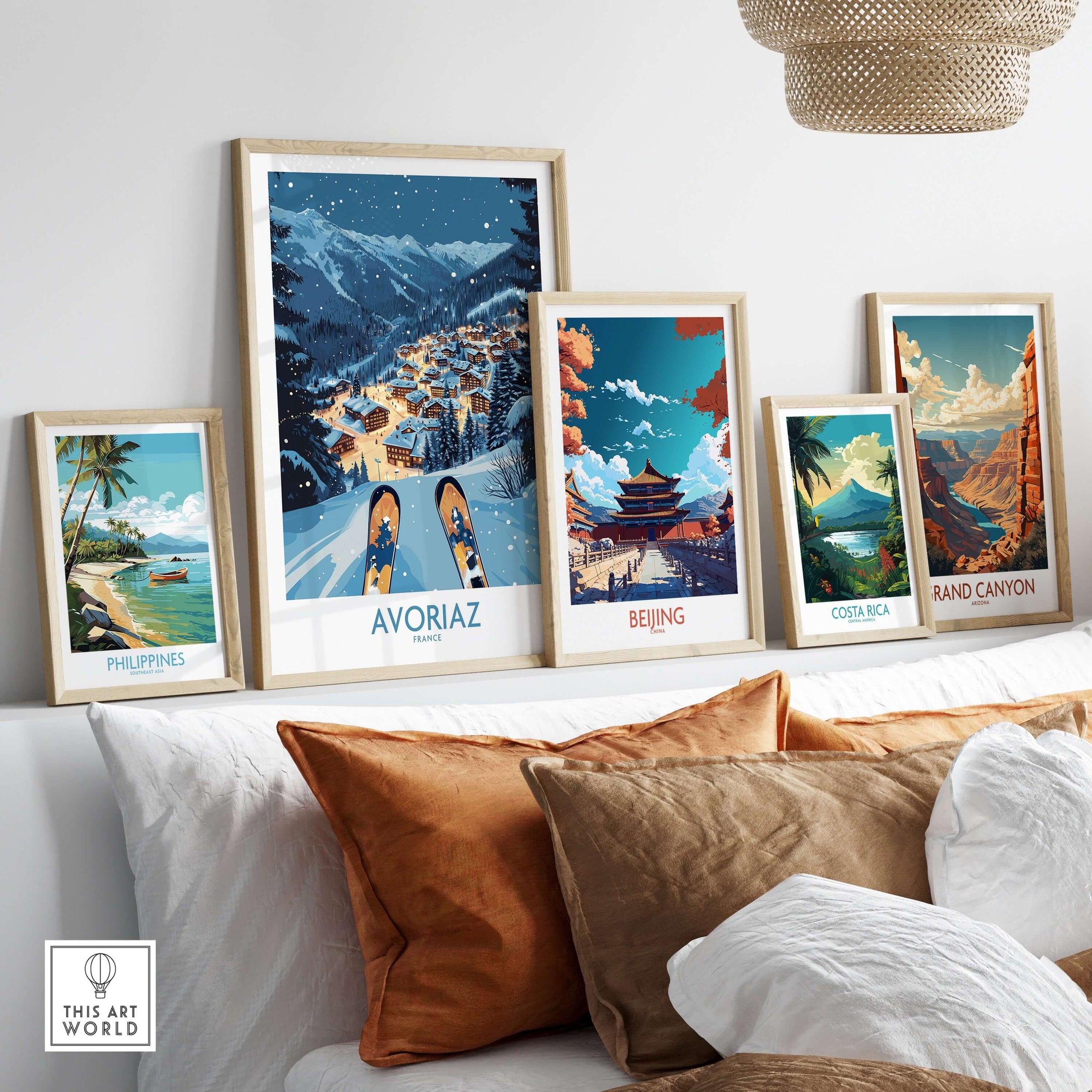 Avoriaz France Art Print | Ski Poster displayed among framed travel art prints on a cozy sofa.