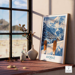 Avoriaz Ski Poster France Print displayed on a shelf near a window, showcasing the snowy Alps and ski village.