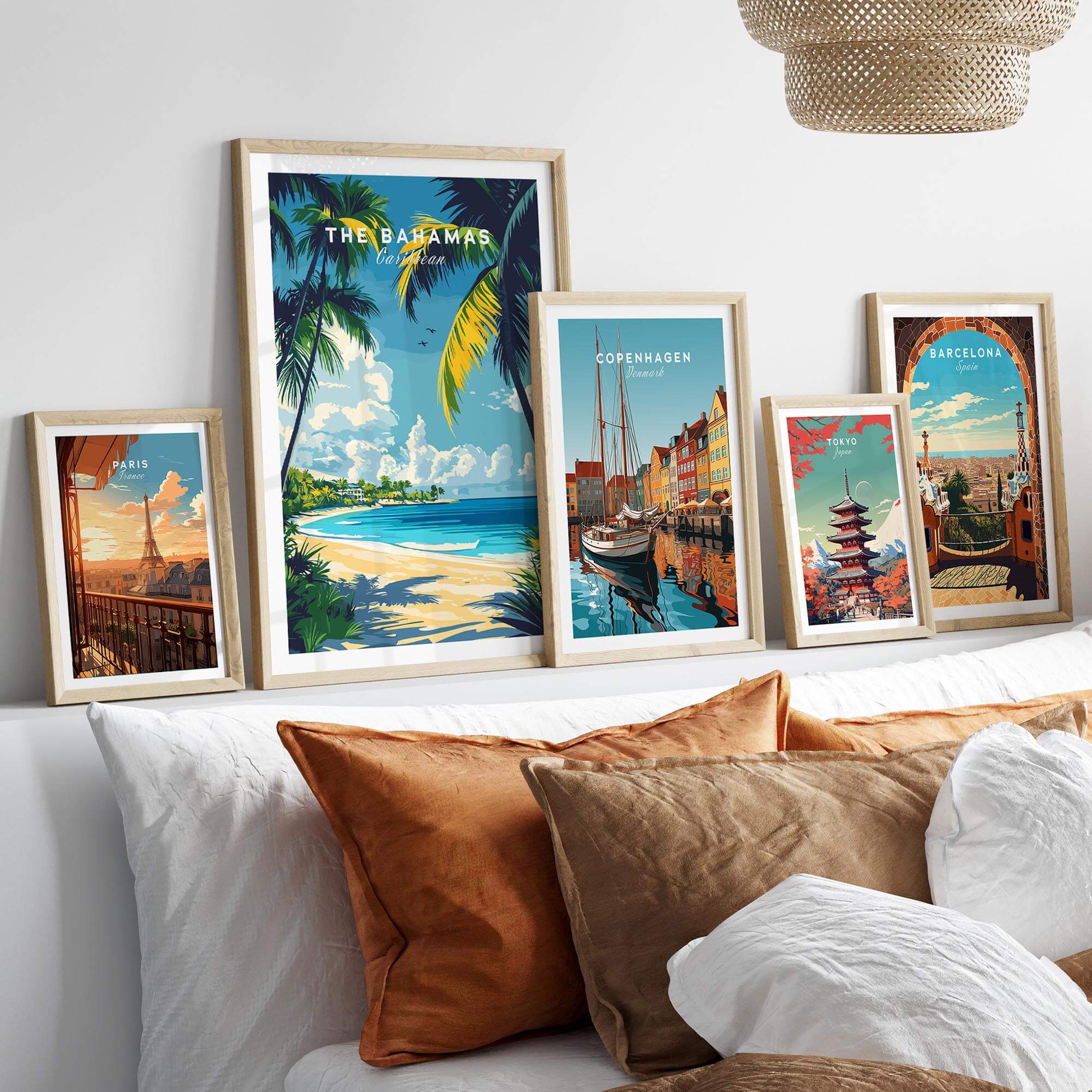 Bahamas Wall Art featuring colorful Caribbean Island Travel Posters arranged above a cozy sofa.