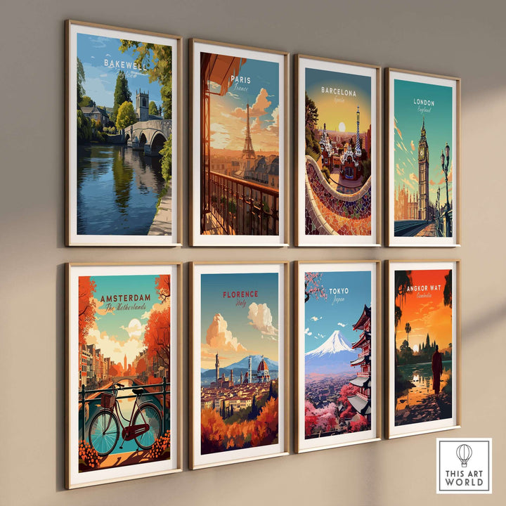 Gallery wall of vibrant city travel posters, featuring Bakewell, Paris, Barcelona, London, Amsterdam, Florence, Tokyo, and Angkor Wat.