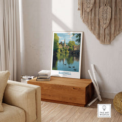 Bakewell Poster - River Wye - Derbyshire Peak District Print - English Village Travel Art - A4 A3 A2 in a cozy living room setting.