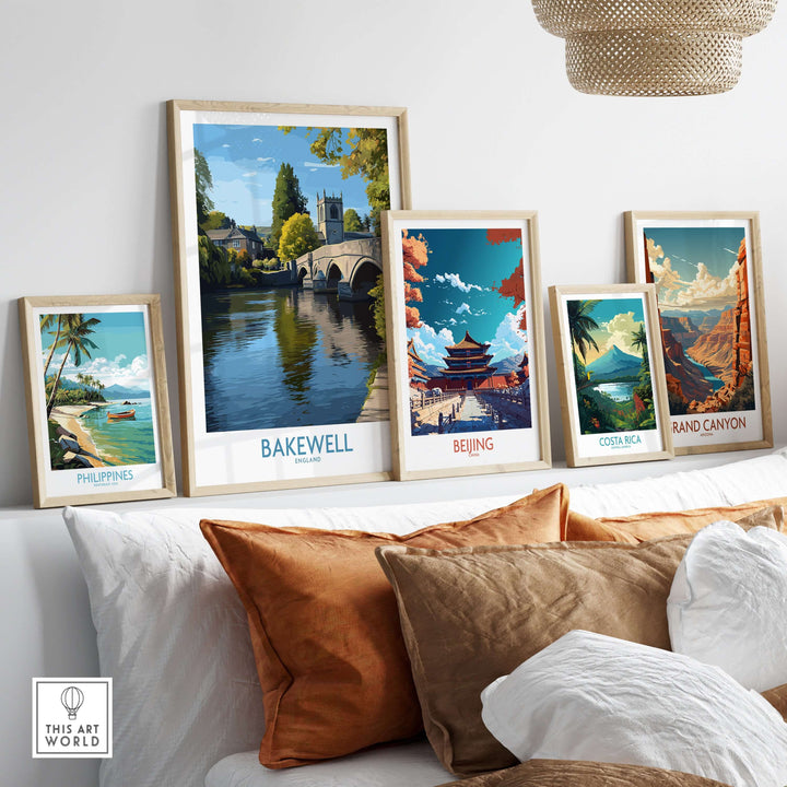 Framed Bakewell poster and global travel art in a stylish decor setup featuring riverside landscapes.