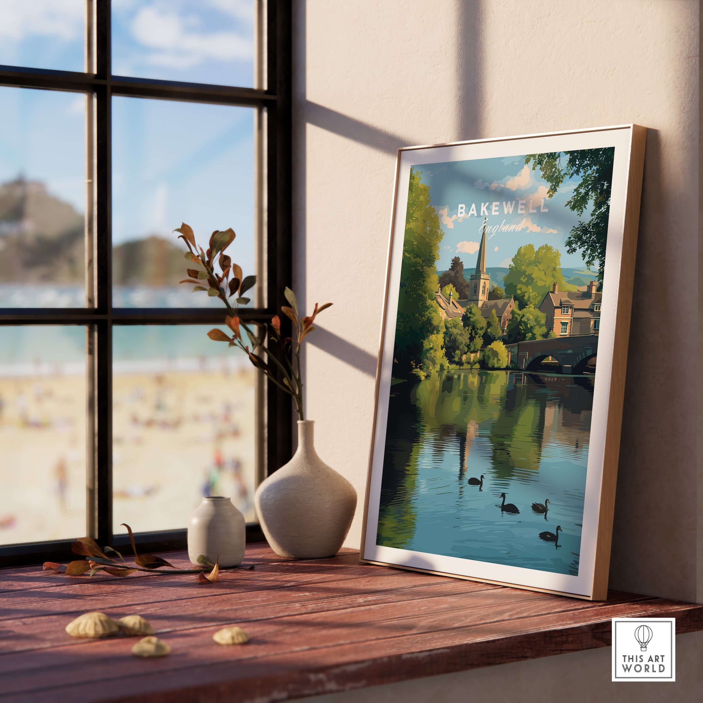 Bakewell Wall Art - River Wye Print - Charming English Village Decor displayed in a sunny window with nature elements.