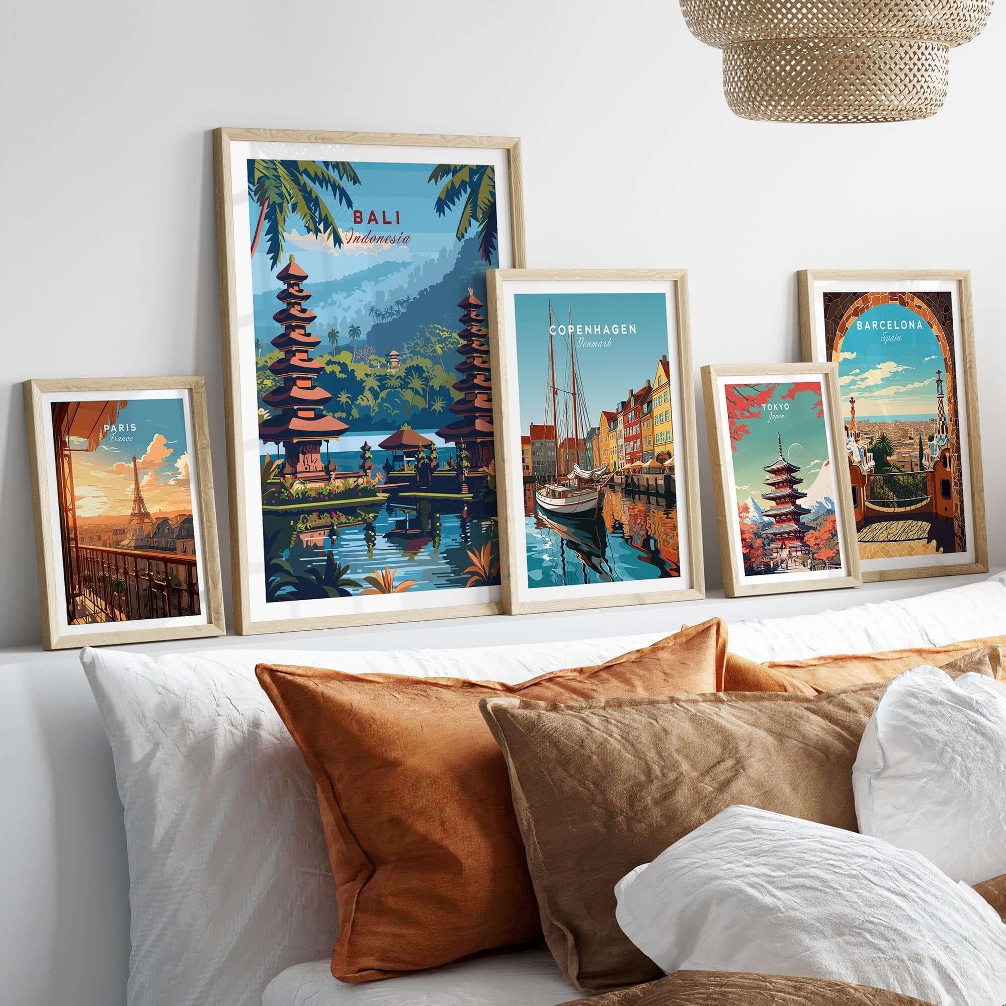 Bali Travel Print - Indonesia displayed among other travel posters on a stylish sofa.