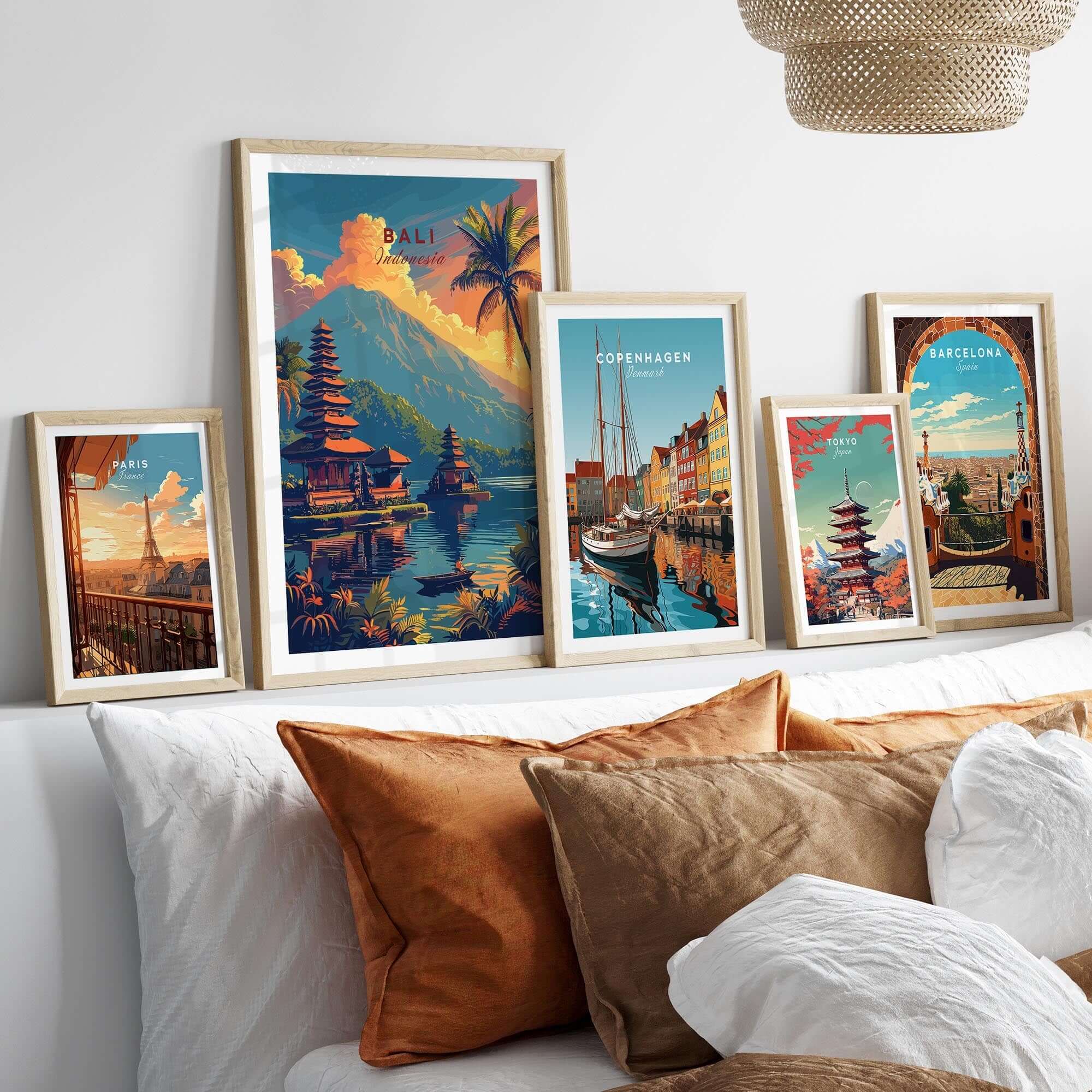 Bali Wall Art Print - Sunset displayed among various travel posters in a stylish home decor setting.