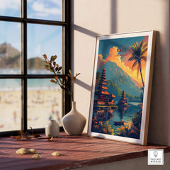 Bali Wall Art Print - Sunset displayed on a wooden table beside a window with a beach view.