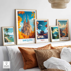 Barcelona Travel Poster displayed among other travel posters on a stylish decorated wall.