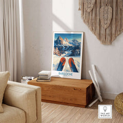 Bariloche Poster Argentina showcased in a stylish living room with wooden furniture and cozy decor.