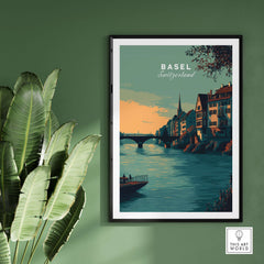 Basel Switzerland Old Town River View Poster - Historic Cityscape Wall Art framed on a green wall with plants.