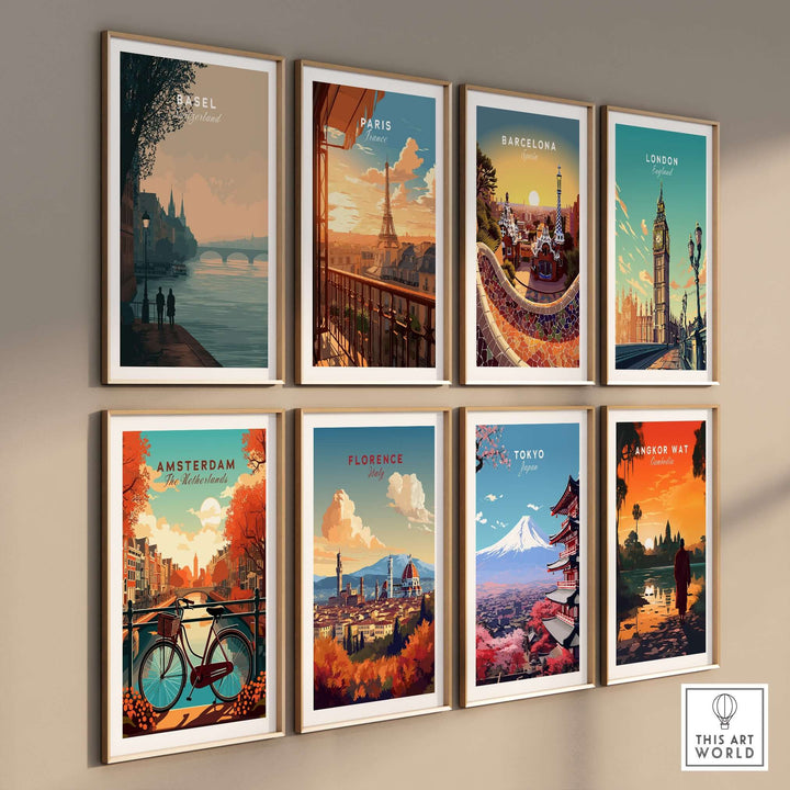 Gallery wall of framed travel posters featuring Basel, Paris, Barcelona, London, Amsterdam, Florence, Tokyo, and Angkor Wat.