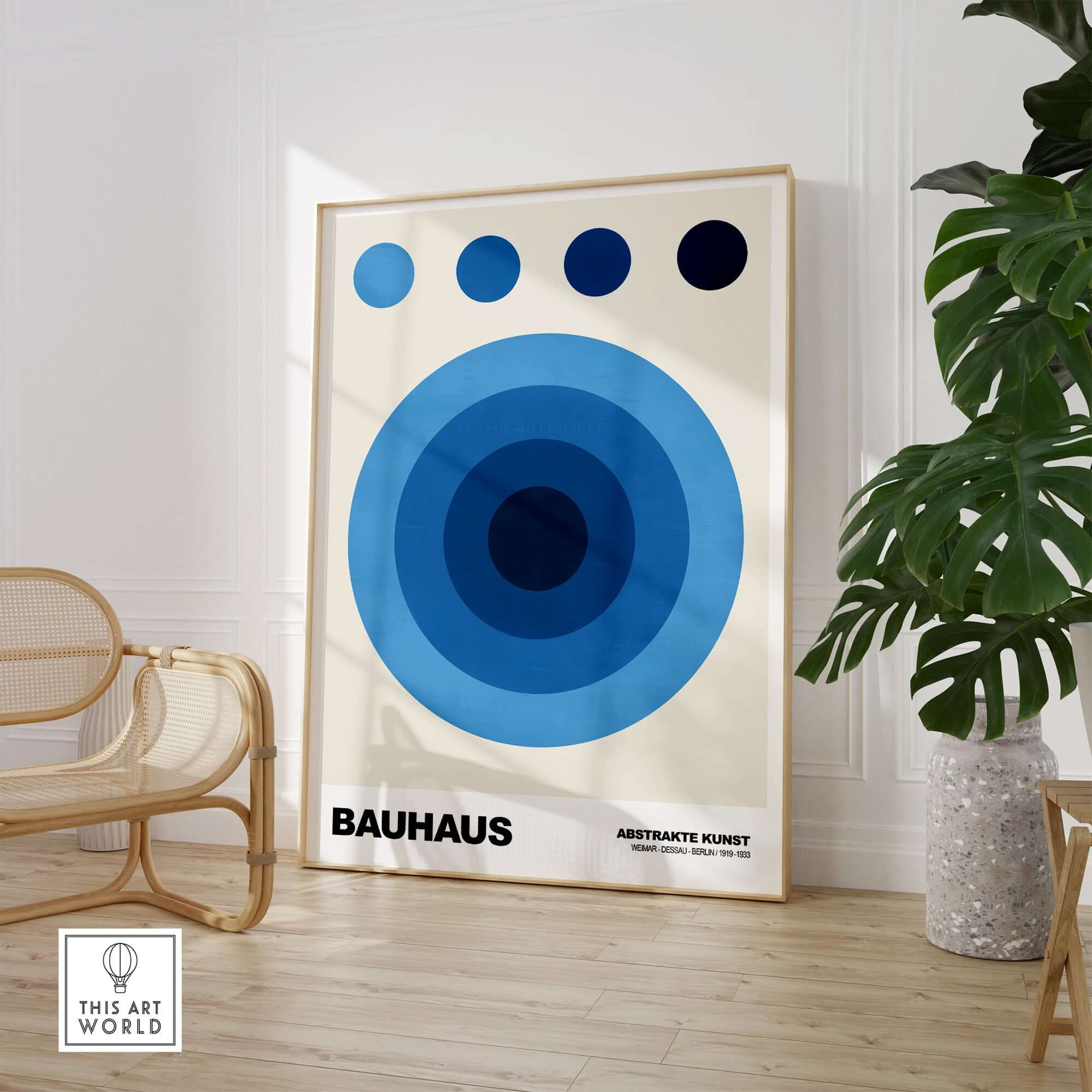 Bauhaus Exhibition Prints - Abstract Blue Circles Poster Geometric Design displayed in modern interior decor with plant.