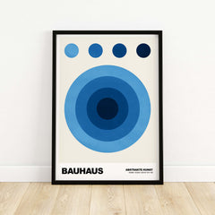 Bauhaus Exhibition Prints - Abstract Blue Circles Poster Geometric Design featuring concentric blue circles on a cream background.