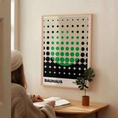 Bauhaus Exhibition Prints - Abstract Circle Pattern Art Print Green Black Dot Gradient showcased in a modern interior setting.