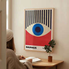 Bauhaus Exhibition Prints - Abstract Eye Art Print Geometric Red Blue Design displayed on a wall in a cozy interior setting.