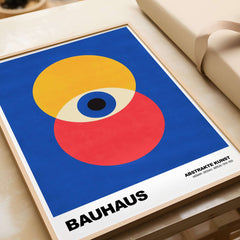 Bauhaus Exhibition Prints - Abstract Eye Circles Poster - Blue Yellow Red Primary Art on display with vibrant colors.