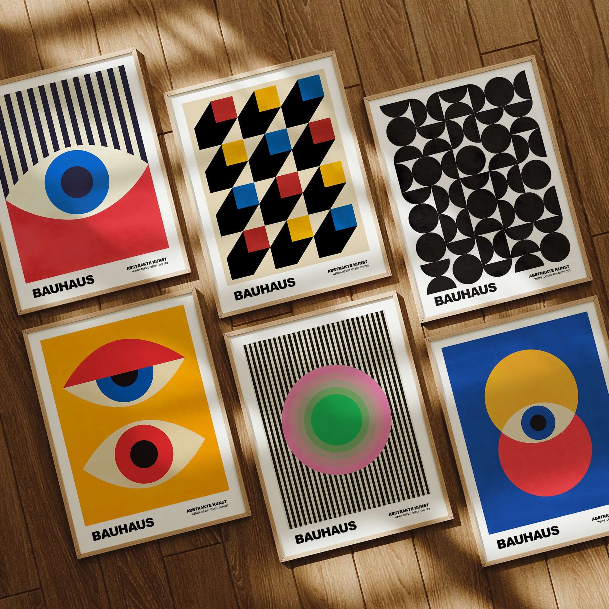 Bauhaus Exhibition Prints - Concentric Circles Poster Pink Green Striped Art displayed in a gallery setting with various designs.