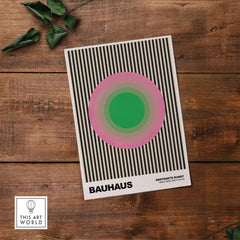 Bauhaus Exhibition Prints - Concentric Circles Poster Pink Green Striped Art with geometric design on wooden background.