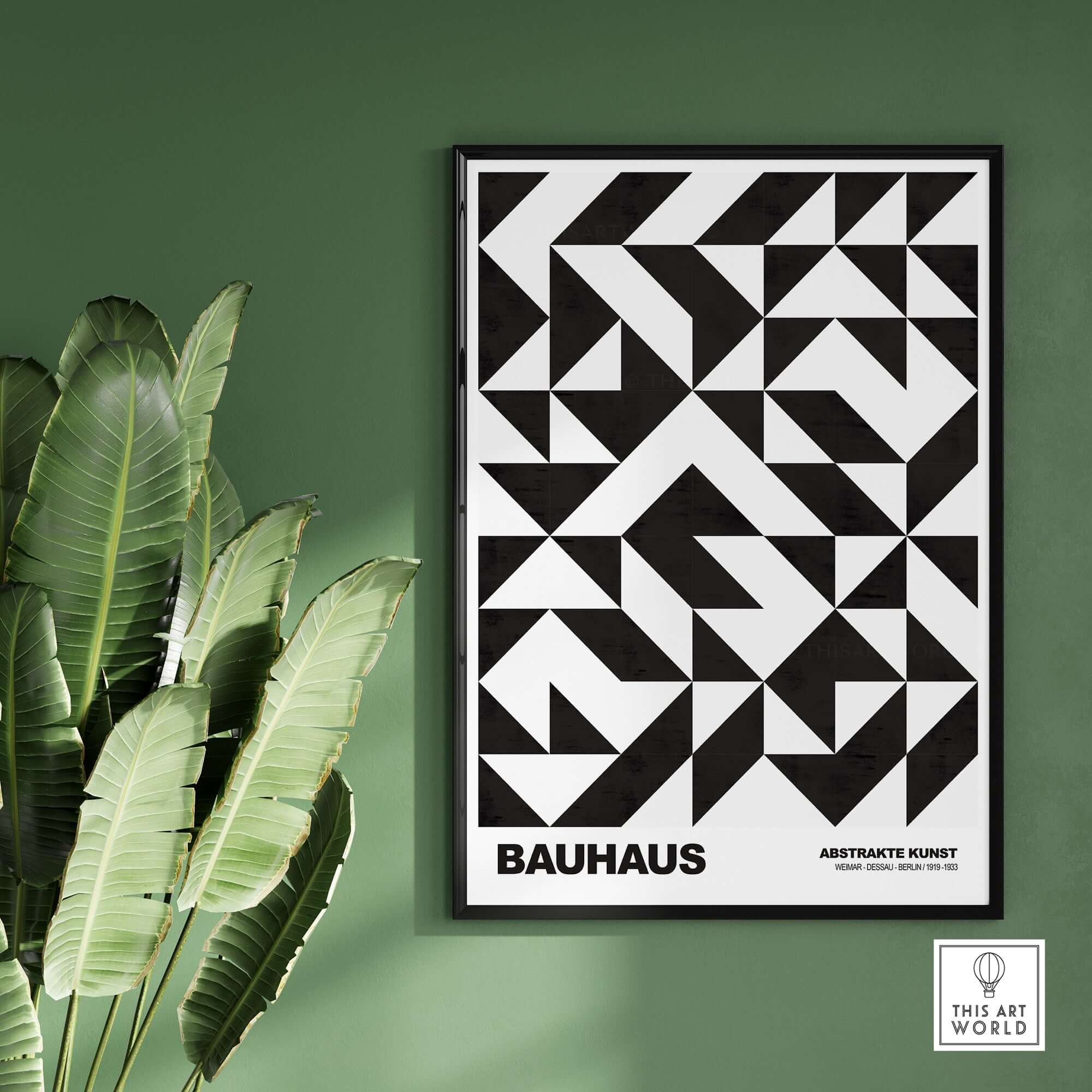 Bauhaus Exhibition Prints - Geometric Triangle Pattern Poster Black White Abstract hanging on a green wall with plants.