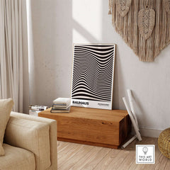 Bauhaus Exhibition Prints -  Optical Wave Lines Art Print Black Cream Abstract displayed in a stylish living room setting.