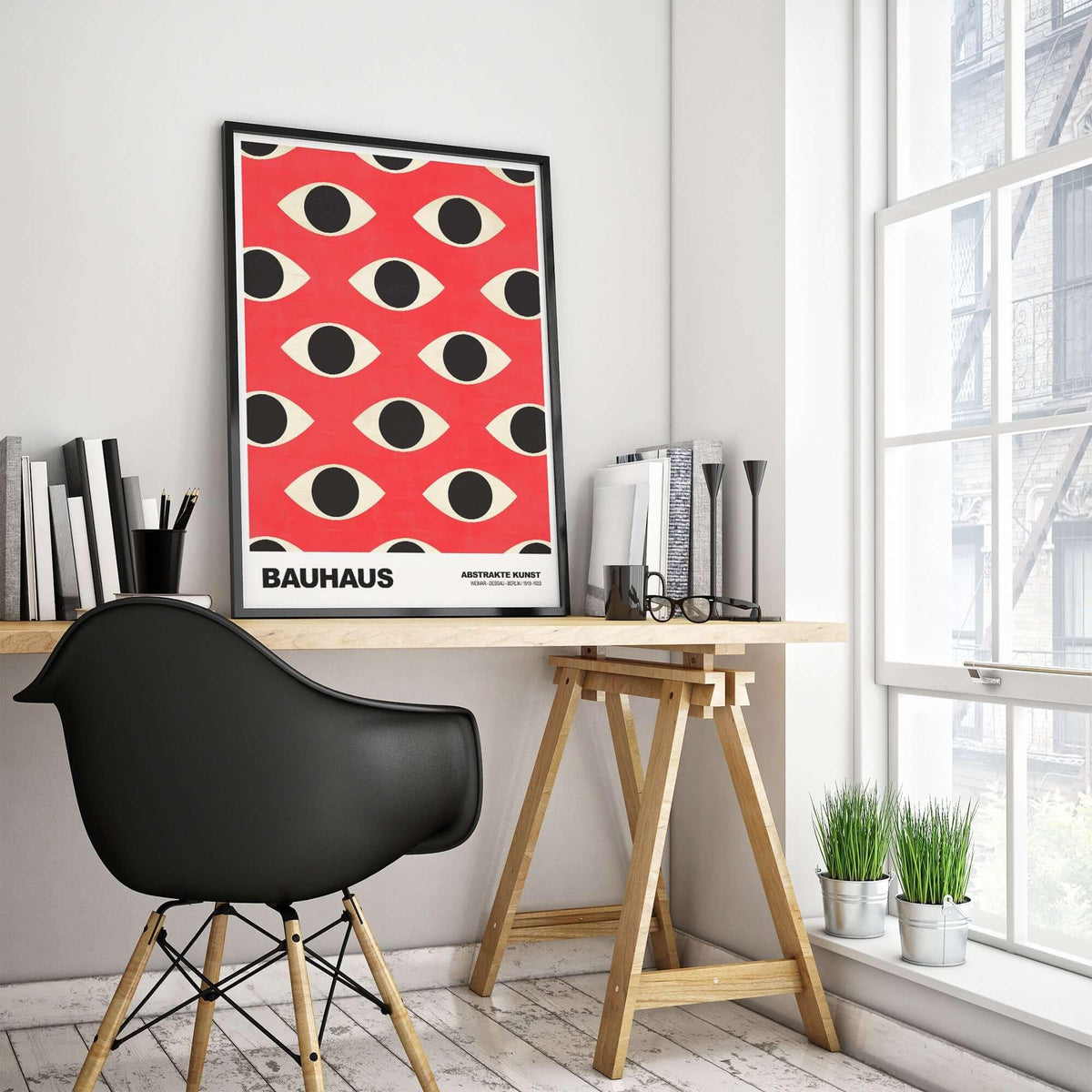 Bauhaus Exhibition Prints - Repeating Eyes Pattern Poster Red Black Cream Art displayed in a stylish interior with desk and chair.