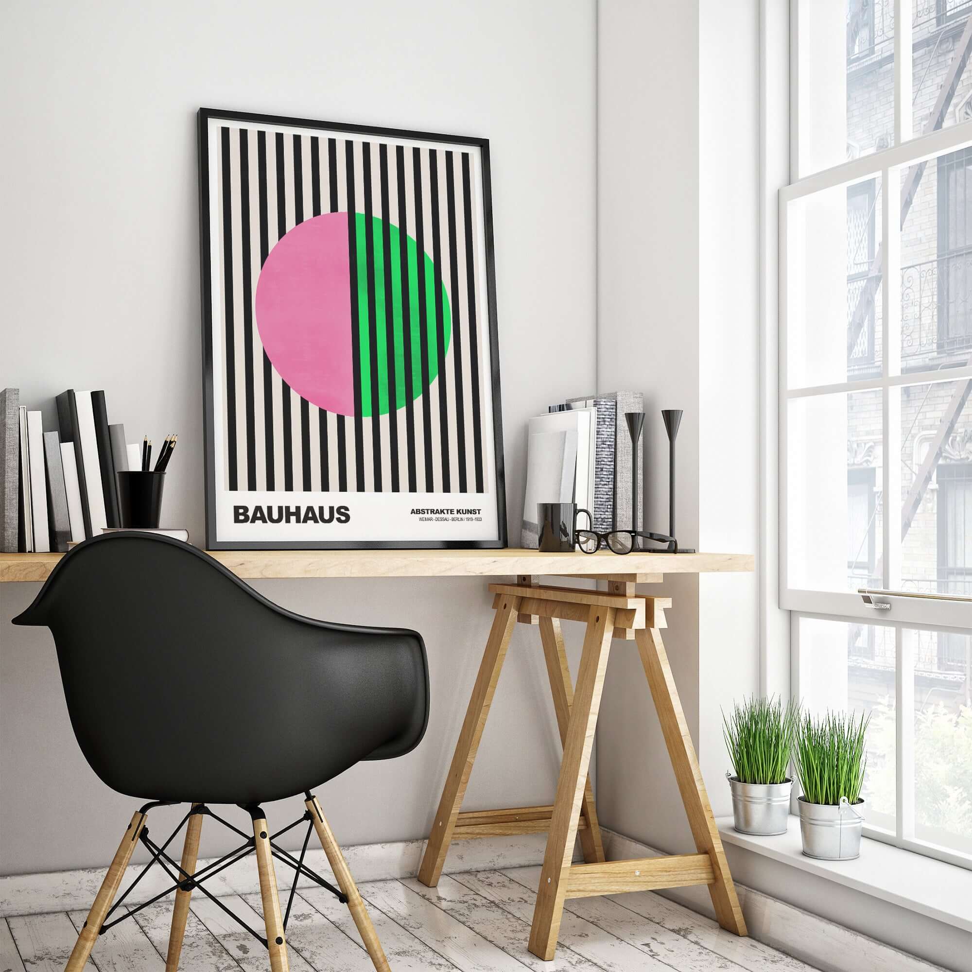 Bauhaus Exhibition Prints - Split Circle Abstract Art Print Pink Green Stripes displayed in a modern workspace.