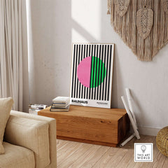 Bauhaus Exhibition Prints - Split Circle Abstract Art Print Pink Green Stripes displayed in a modern living room setting.