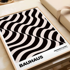 Bauhaus Exhibition Prints - Thick Undulating Waves Poster Black Cream Abstract Art displayed in a stylish frame.