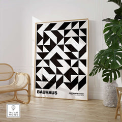 Bauhaus Exhibition Prints - Geometric Triangle Pattern Poster Black White Abstract in a modern interior setting.