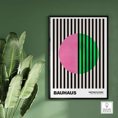 Bauhaus Exhibition Prints - Split Circle Abstract Art Print Pink Green Stripes featuring a vibrant pink and green design.
