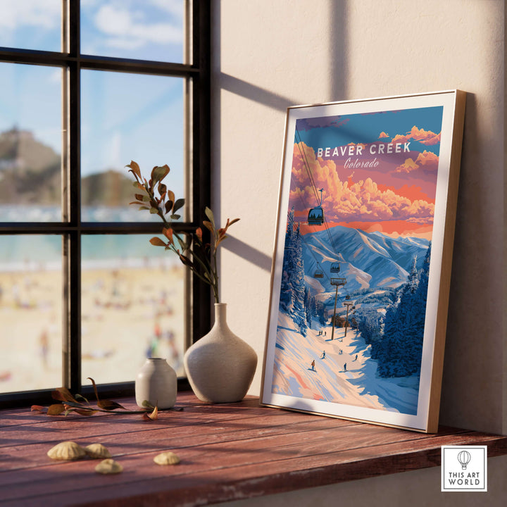 Framed Beaver Creek Colorado ski lift sunset print on a wooden table with flowers, featuring snowy mountain views.
