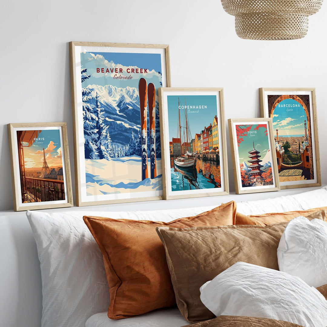 Beaver Creek Colorado ski poster among framed travel art prints in a cozy room setting.