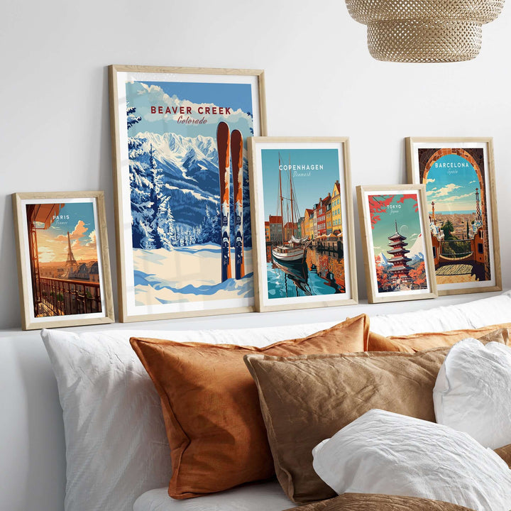 Beaver Creek Colorado ski poster among framed travel art prints in a cozy room setting.
