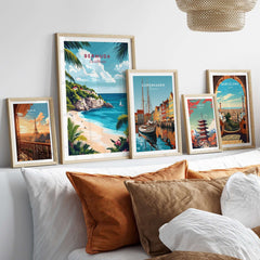 Bermuda Travel Print surrounded by colorful travel posters on a stylish couch, evoking island vibes and wanderlust.