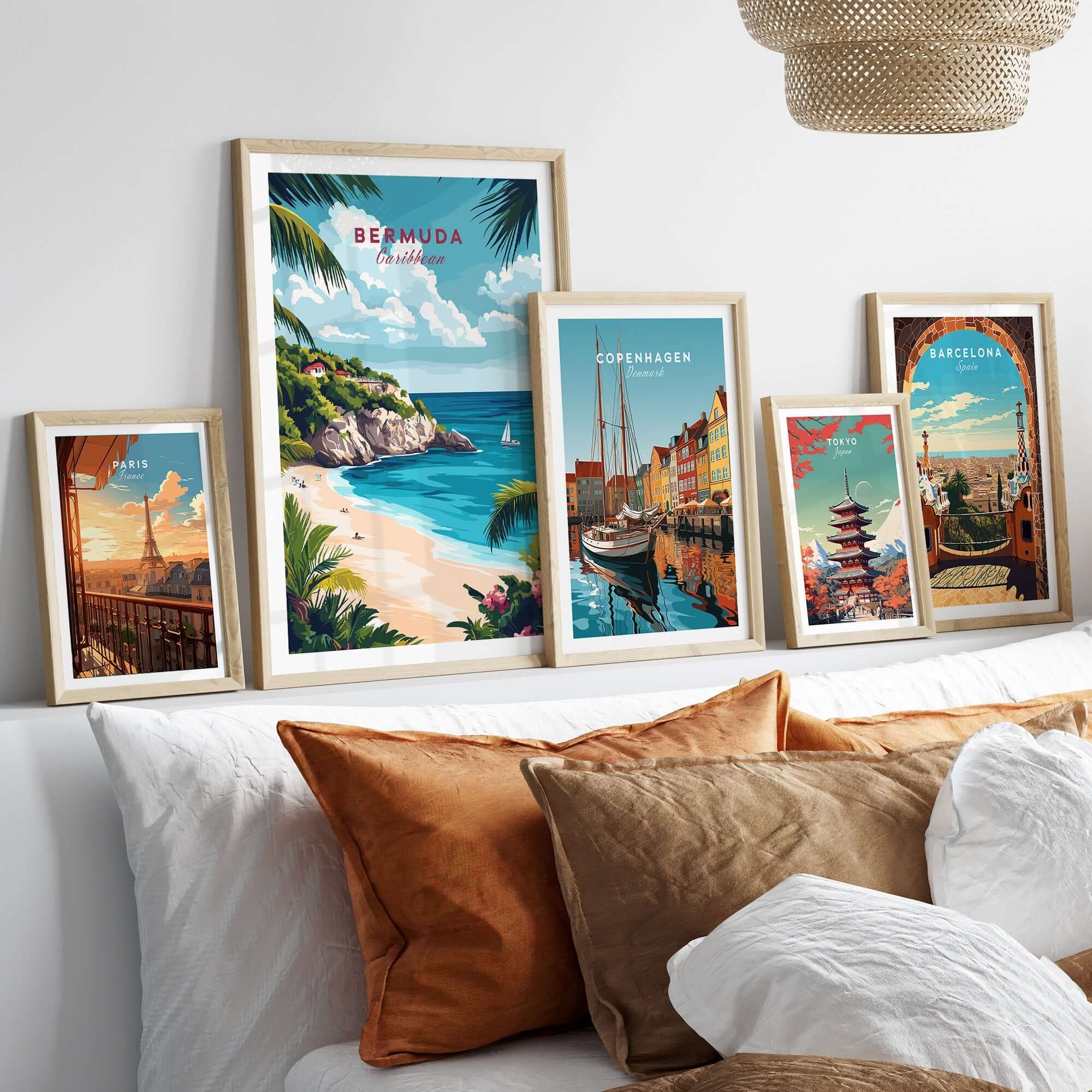 Bermuda Travel Print surrounded by colorful travel posters on a stylish couch, evoking island vibes and wanderlust.
