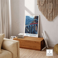 Bernina Express Poster | Snowy Mountain Train Poster featuring a train on a scenic bridge in a cozy living room setting.